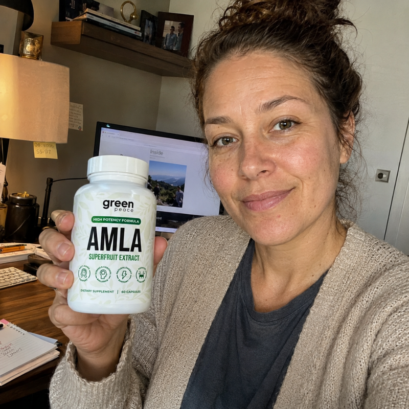 Customer holding organic amla capsules, Indian gooseberry